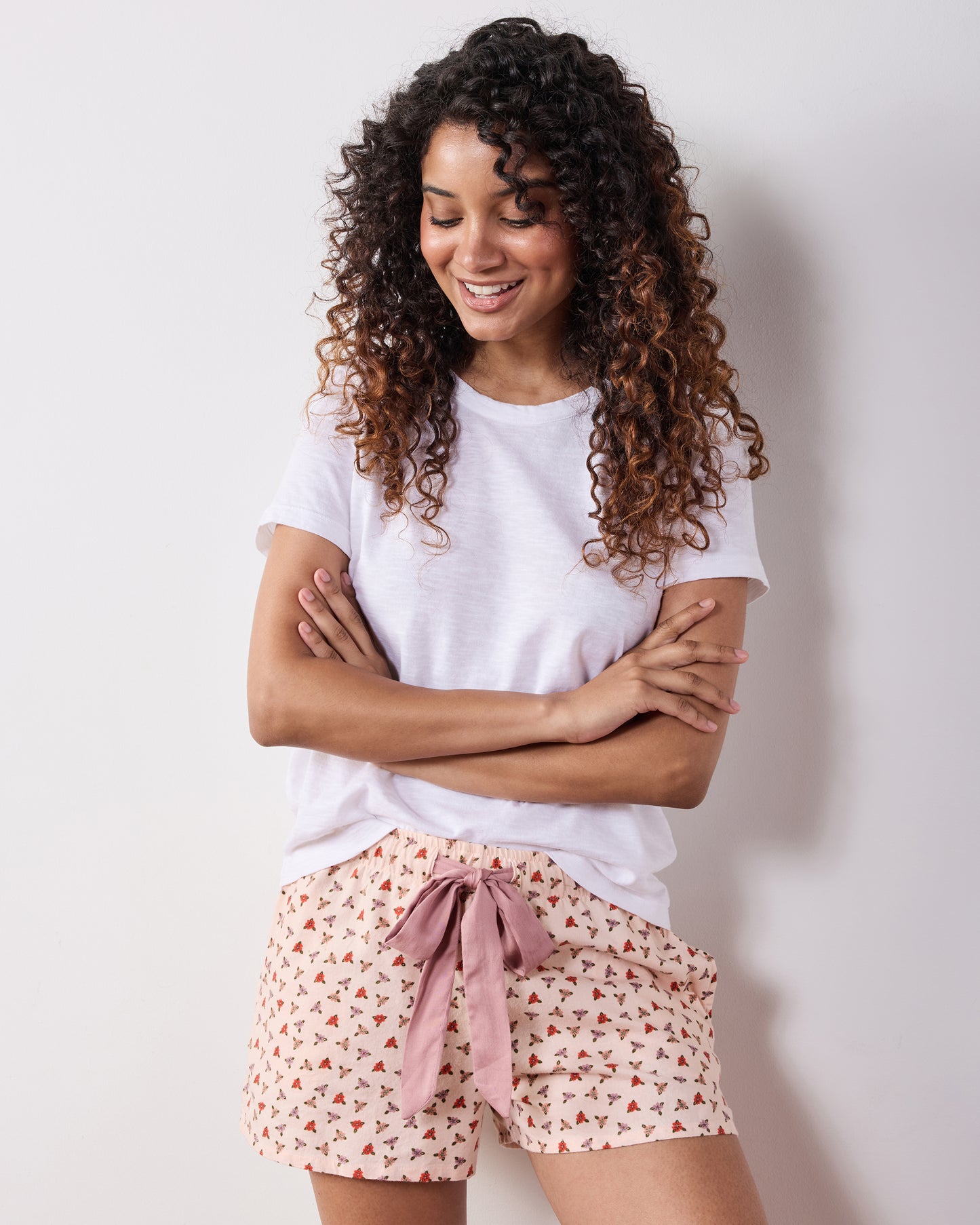 Model wearing the Western Scenes Astrid shorts with a white short-sleeve shirt, shown from the front.