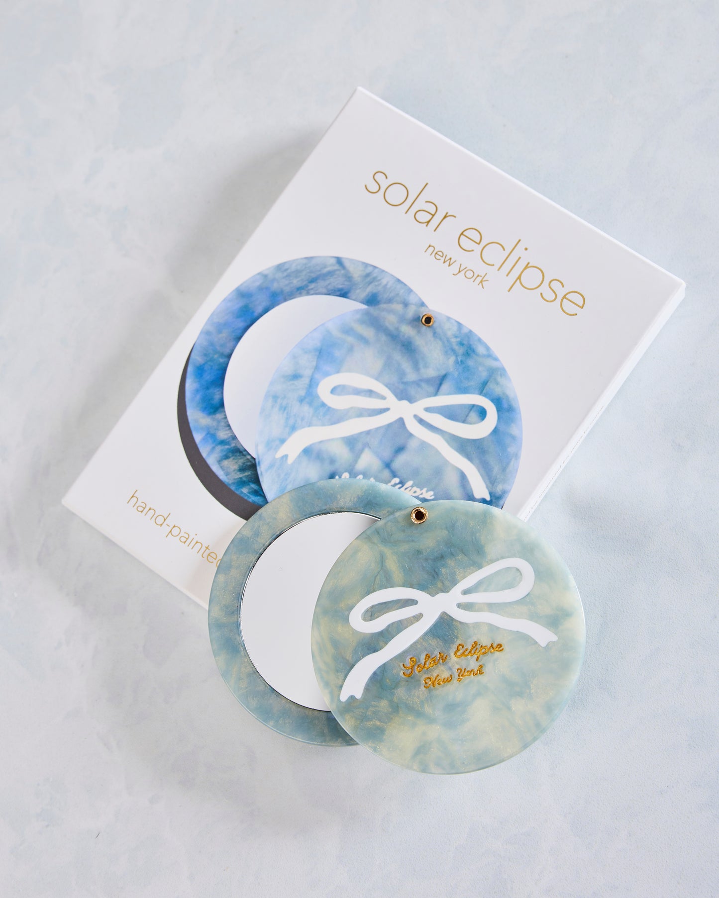 Solar Eclipse - Hand Painted Baby Blue Bow Compact Mirror - Baby Blue - Printfresh