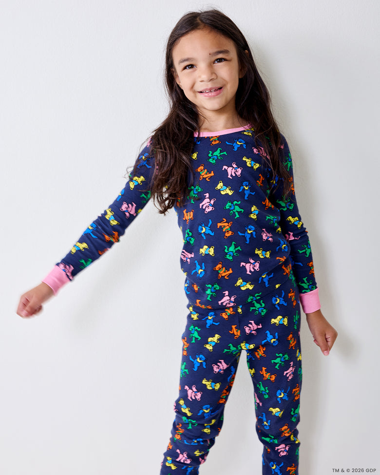 Close view of a child wearing the Dancing Bears kids pajama top and pants.