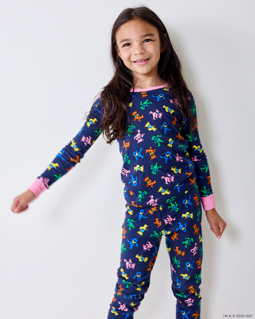 Close view of a child wearing the Dancing Bears kids pajama top and pants.