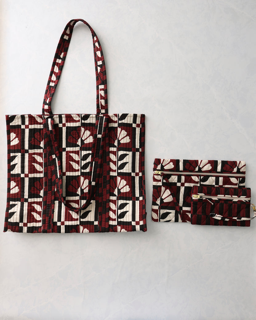 Poppy patterned tote and two matching zip pouches shown side by side.