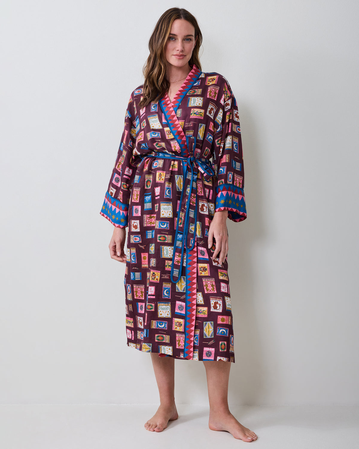 Full front view of the Cabernet Painted Matchbook robe with a belted waist, long sleeves, pockets, and contrasting geometric trim.