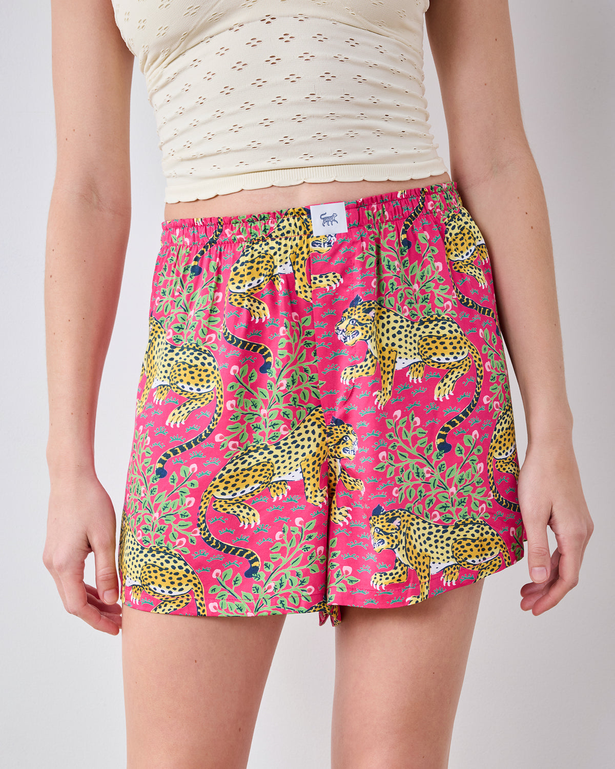 Close-up front view of hot pink Bagheera boyfriend boxers with a leopard-and-jungle-cat print.