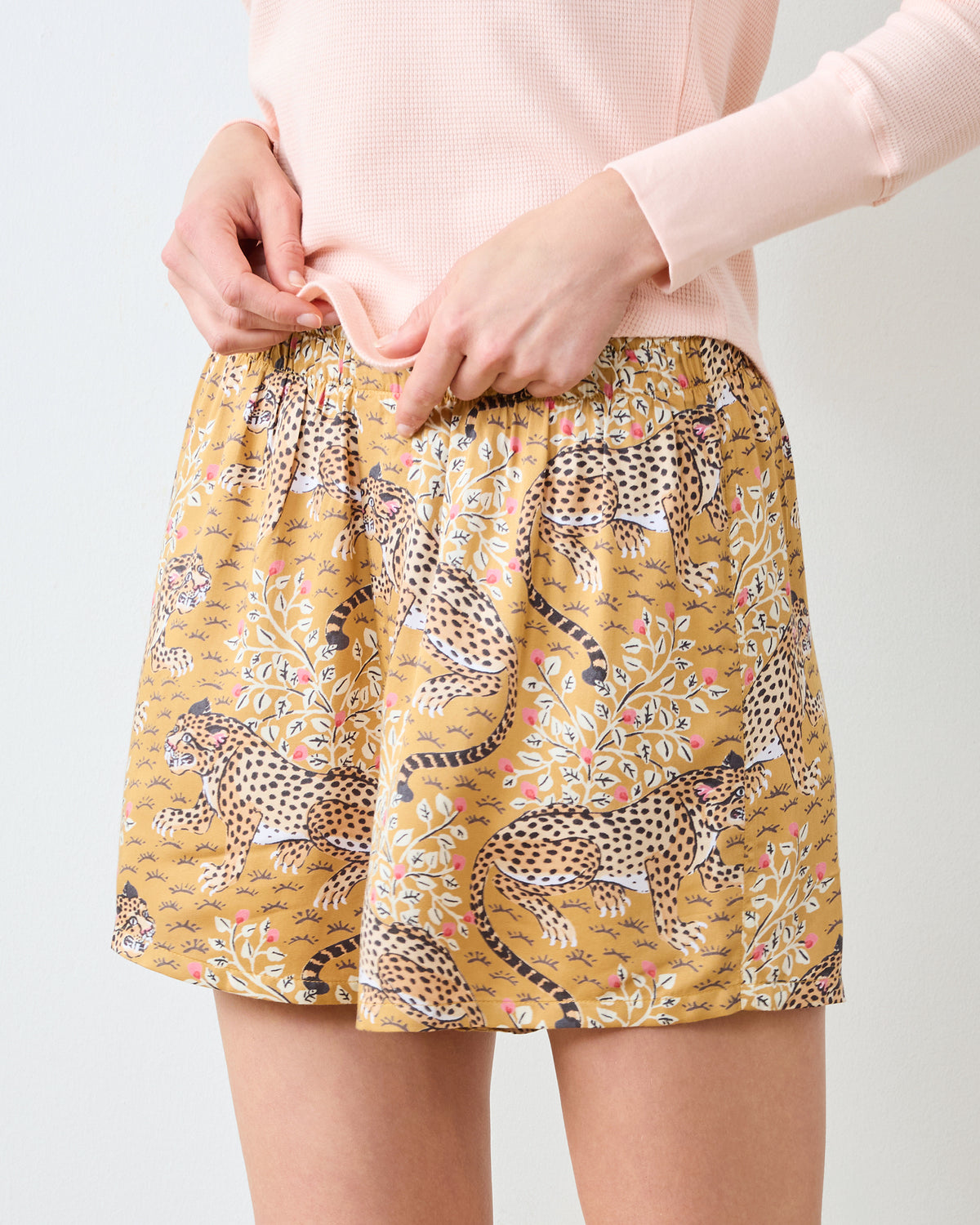 Close-up front view of tobacco Bagheera boyfriend boxers with a leopard print and functional fly.