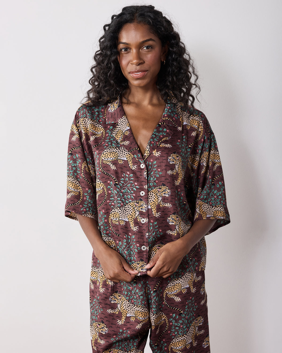 Front view of the Bagheera Eco Satin Wildest Dreams Pajama Set in Raisin with a button-front top and matching wide-leg pants.