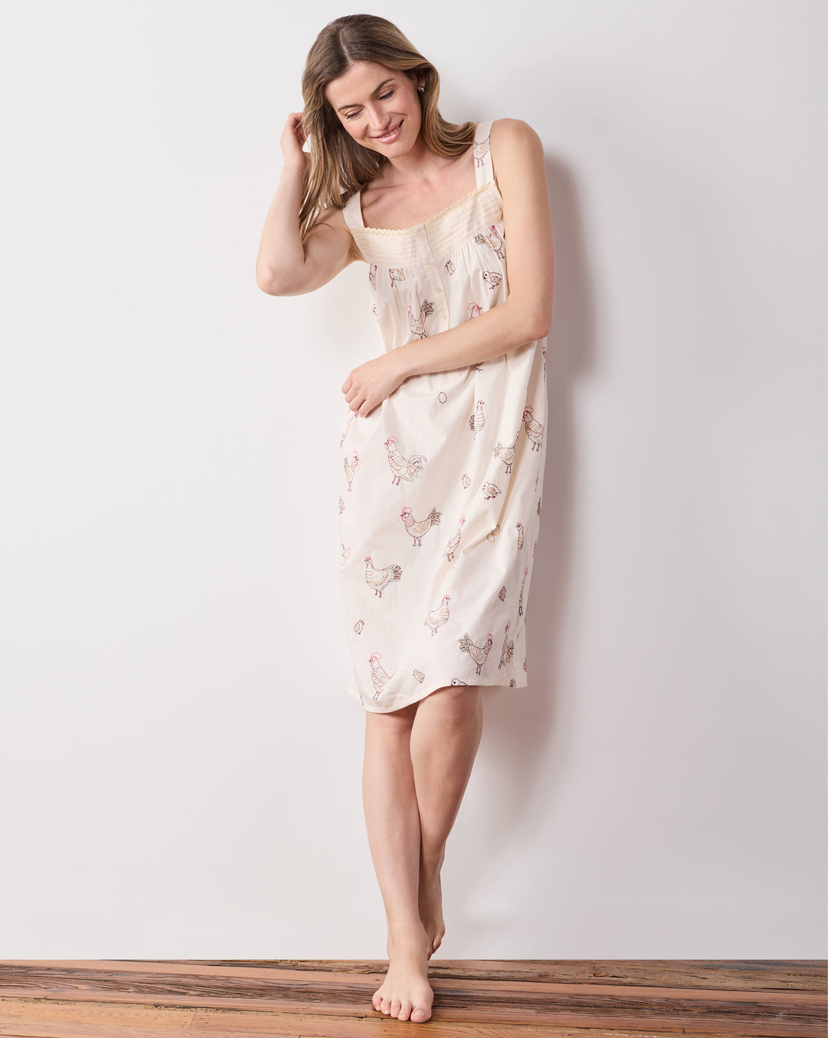 Full-length view of the buff embroidered-hen Back to Bed nightgown.