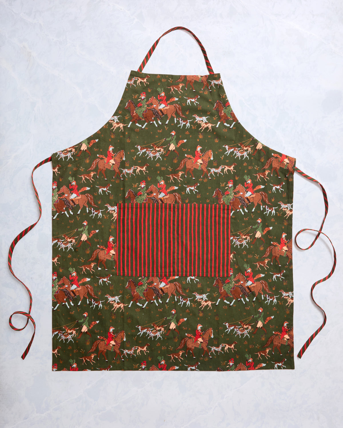 Fox & Hounds apron laid flat, with an adjustable neck strap, side ties, front pocket, and horse-and-hounds print.