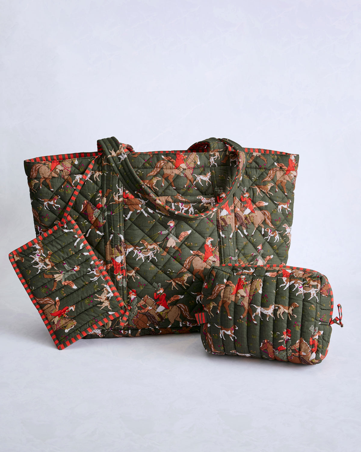 Fox and horse print weekender bag with matching quilted pouch and detachable rectangular accessory.