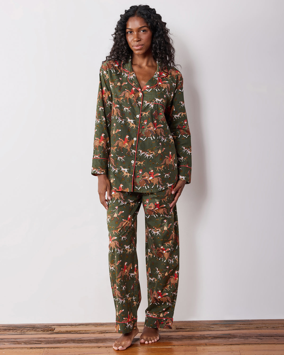 Full-length front view of a model wearing the Fox & Hounds petite pajama set with a button-down top and matching pants.