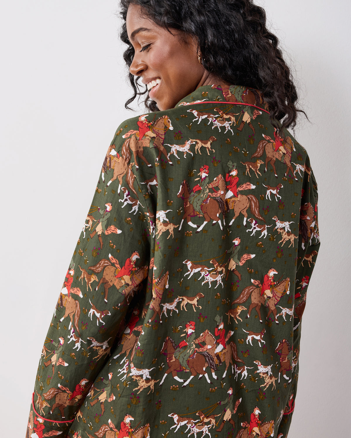 Back view of a model wearing the Fox & Hounds tall pajama set, showing the printed back of the top and matching pants.