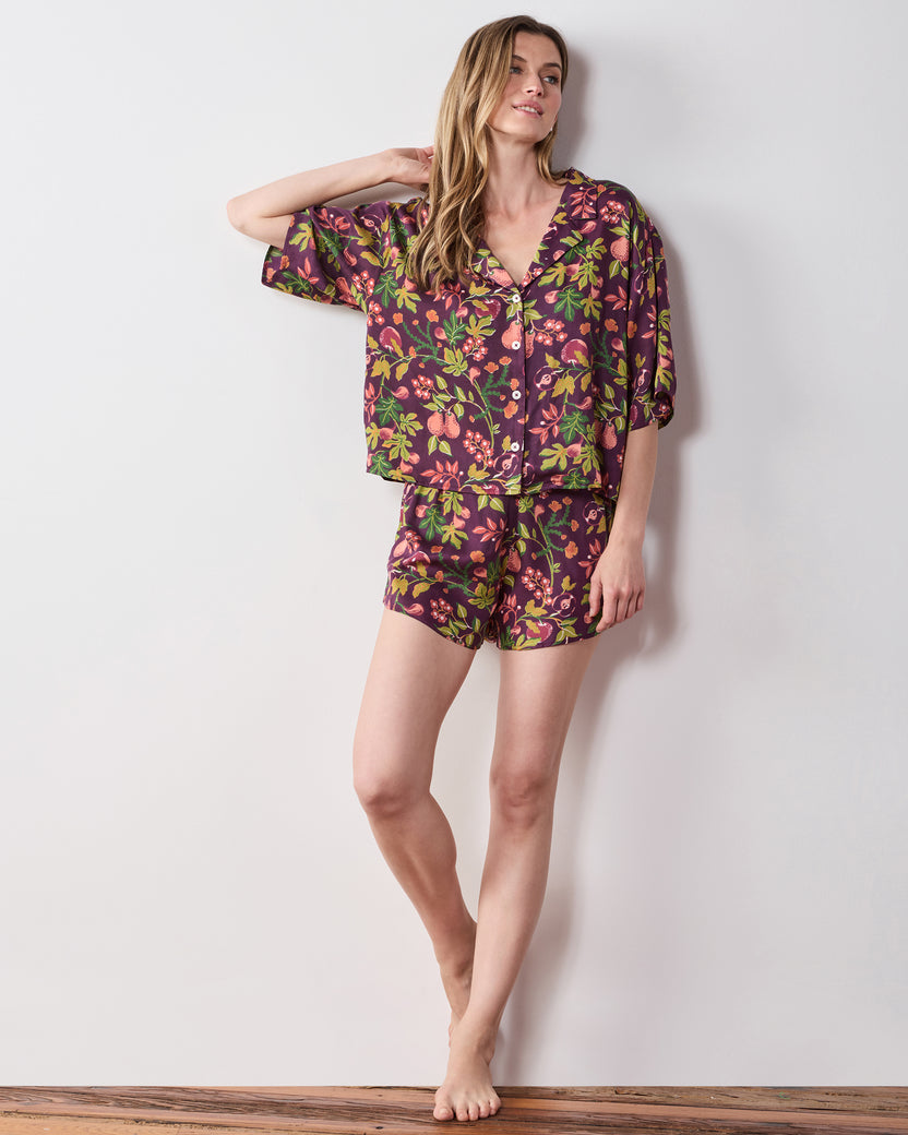 Full front view of the plum Pomme & Poire Sweet Dreams short pajama set with a cropped button-front top and shorts.