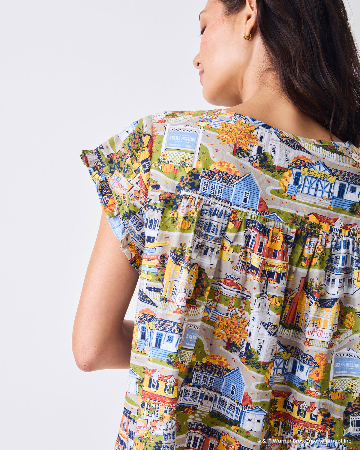 Back view of the Stars Hollow printed nightgown showing the ruffled short sleeves and gathered back yoke.