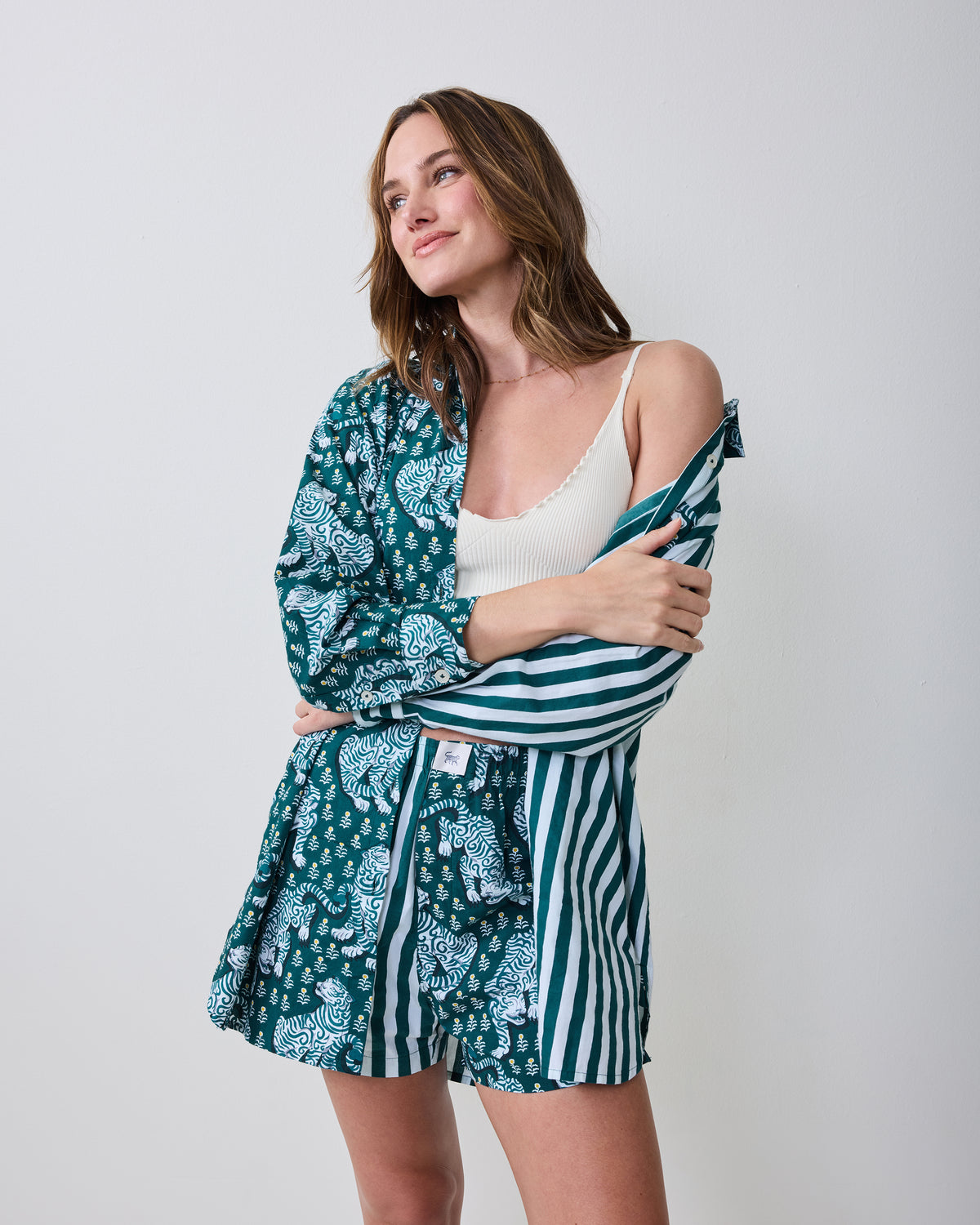 Model wearing the Game Day Green Tiger Queen boxer shorts with a matching open long-sleeve shirt.