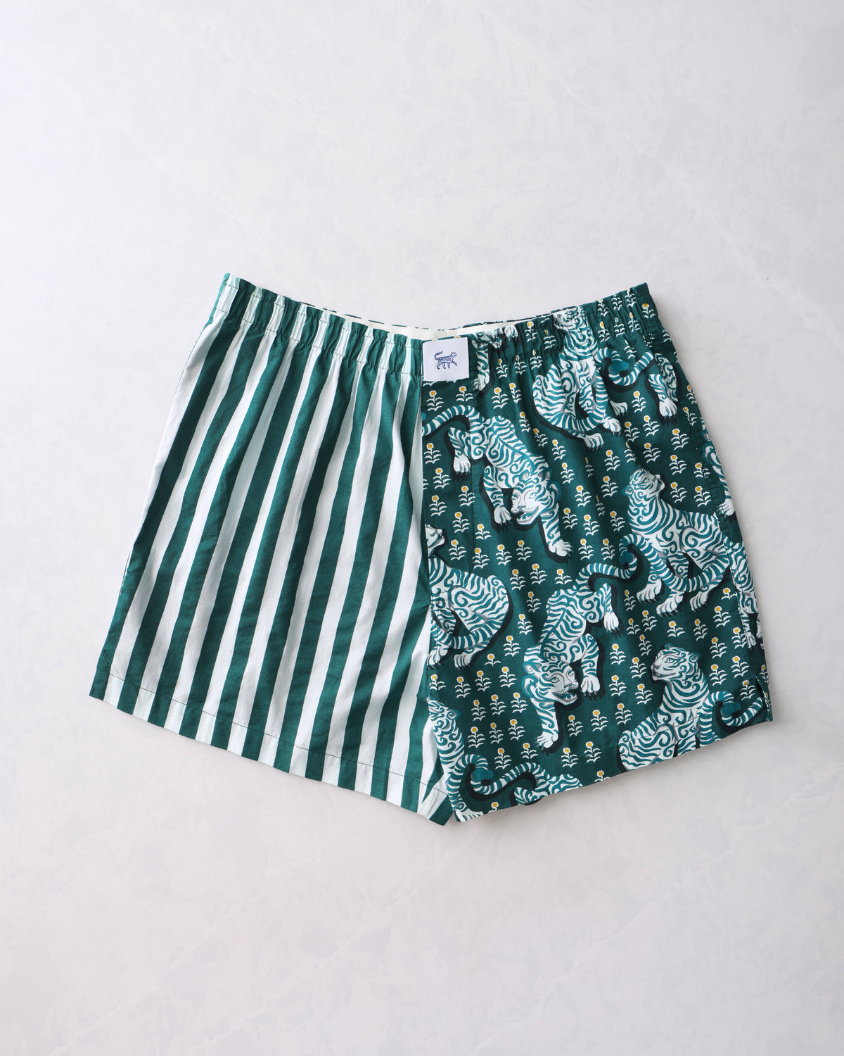 Game Day Green Tiger Queen men's boxer shorts laid flat, showing green-and-white stripes and tiger print.