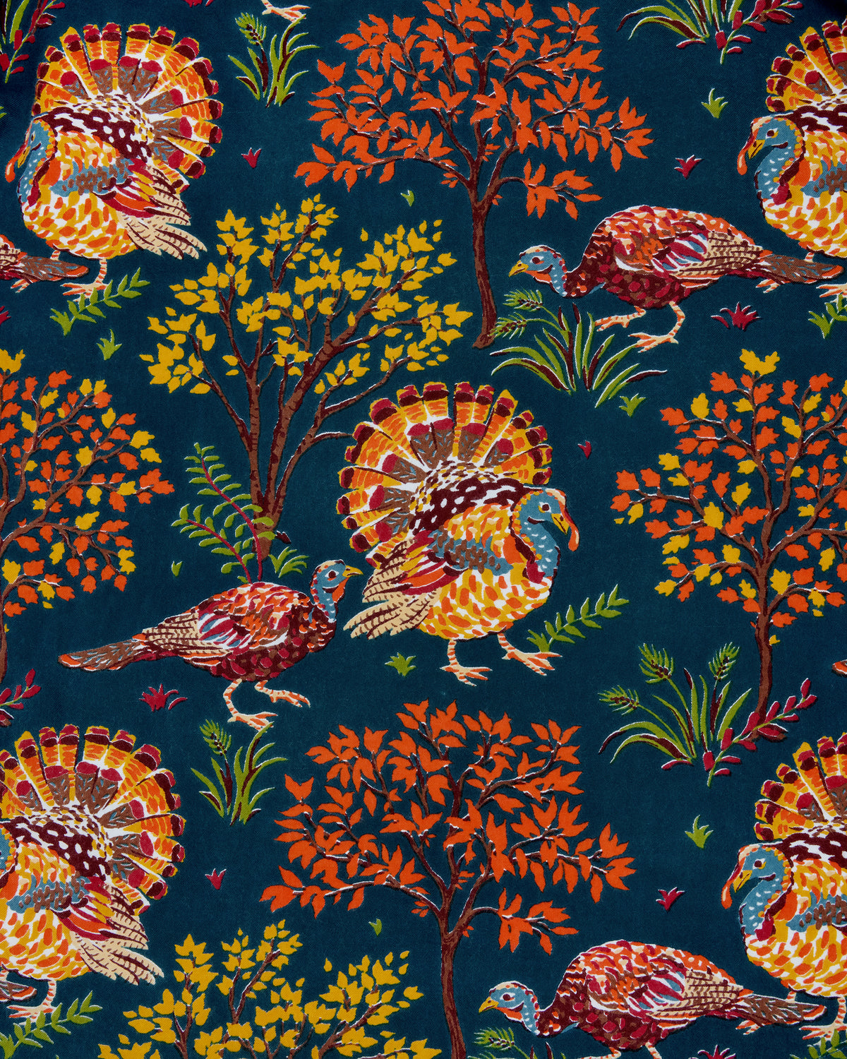 Close-up of the Turkey Trot autumn turkey and foliage print on a navy background.
