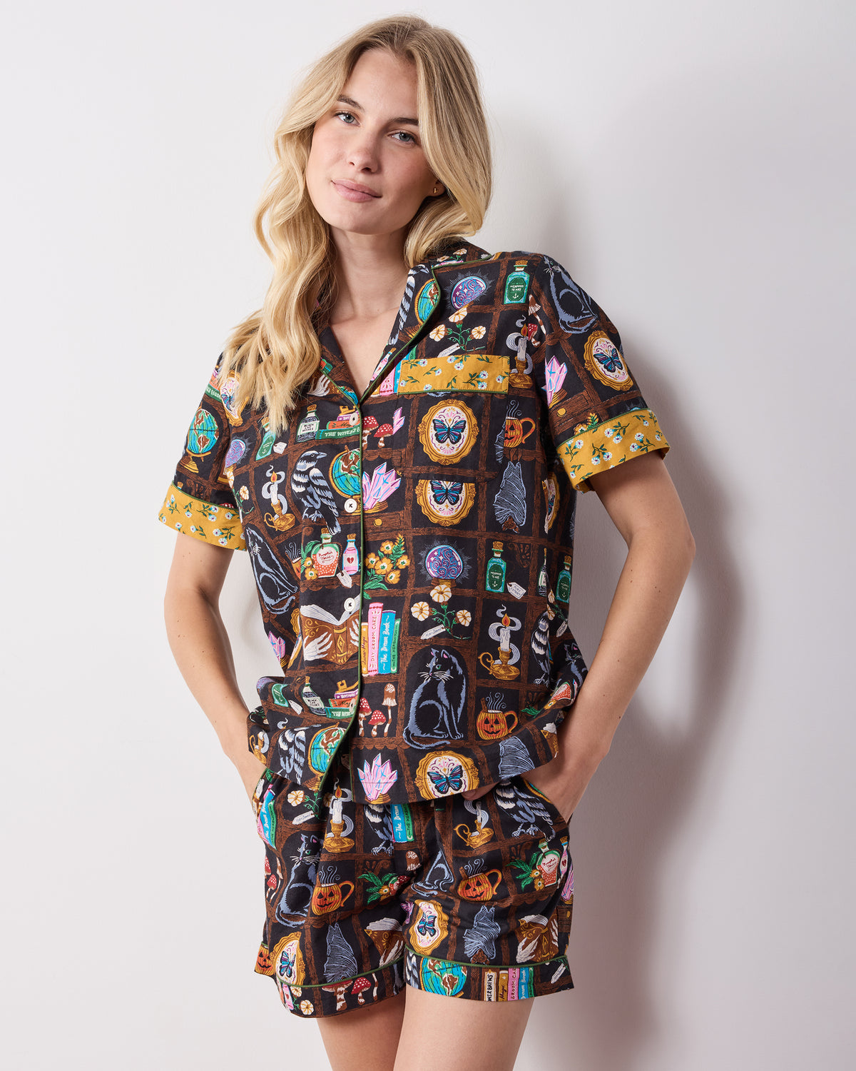 Front view of the Enchanted Study short pajama set with a collared button-down top, short sleeves, and matching shorts.