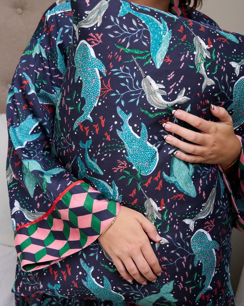 Close view of the Blue Chill Arctic Sealife pajama top with whale and seal print and contrasting geometric cuffs