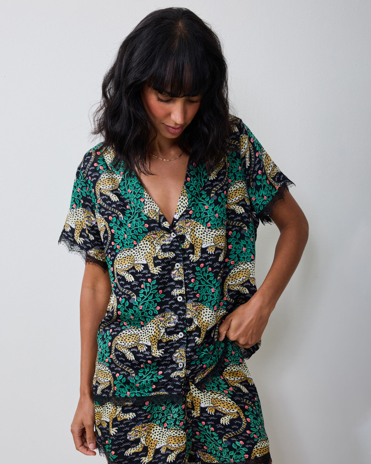Front view of the Bagheera Eco Satin Maryanne Set in Ink, showing a short-sleeve button-front top and matching shorts with lace trim.