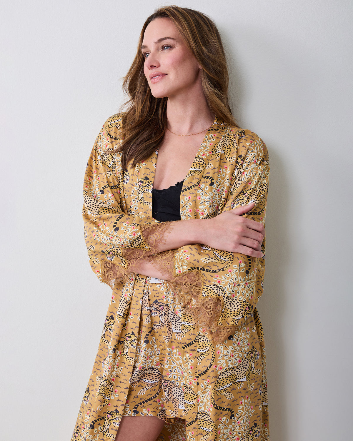 Bagheera Tobacco leopard-print lace robe shown from the front with the belt tied over a black top.