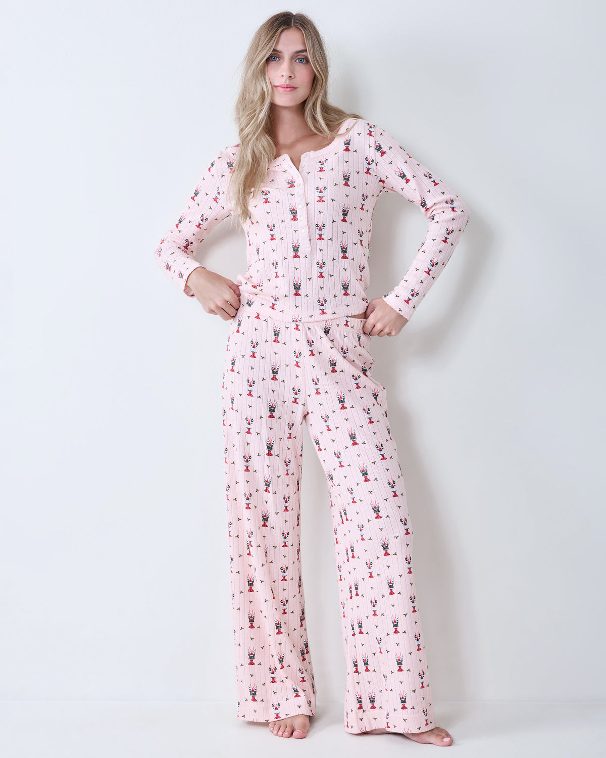 Front view of the Christmas Claws long-sleeve top and wide-leg pajama pants set.