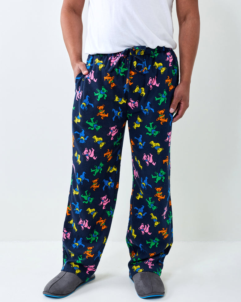 Front view of the Dancing Bears men’s long pajama pants, showing an elastic drawstring waist, side pockets, and colorful bear print.