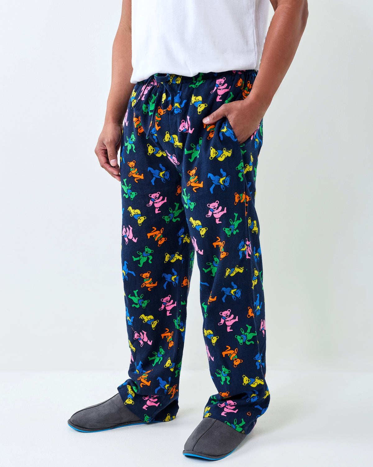 Angled front view of the Dancing Bears long pajama pants, showing the colorful bear print and side pocket.