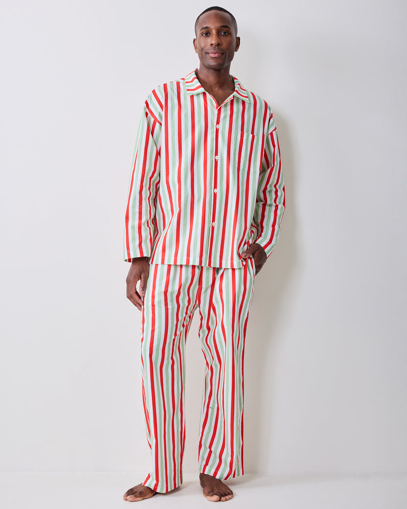 Full-length front view of a person wearing the Elf Stripes sage and cherry long pajama set.