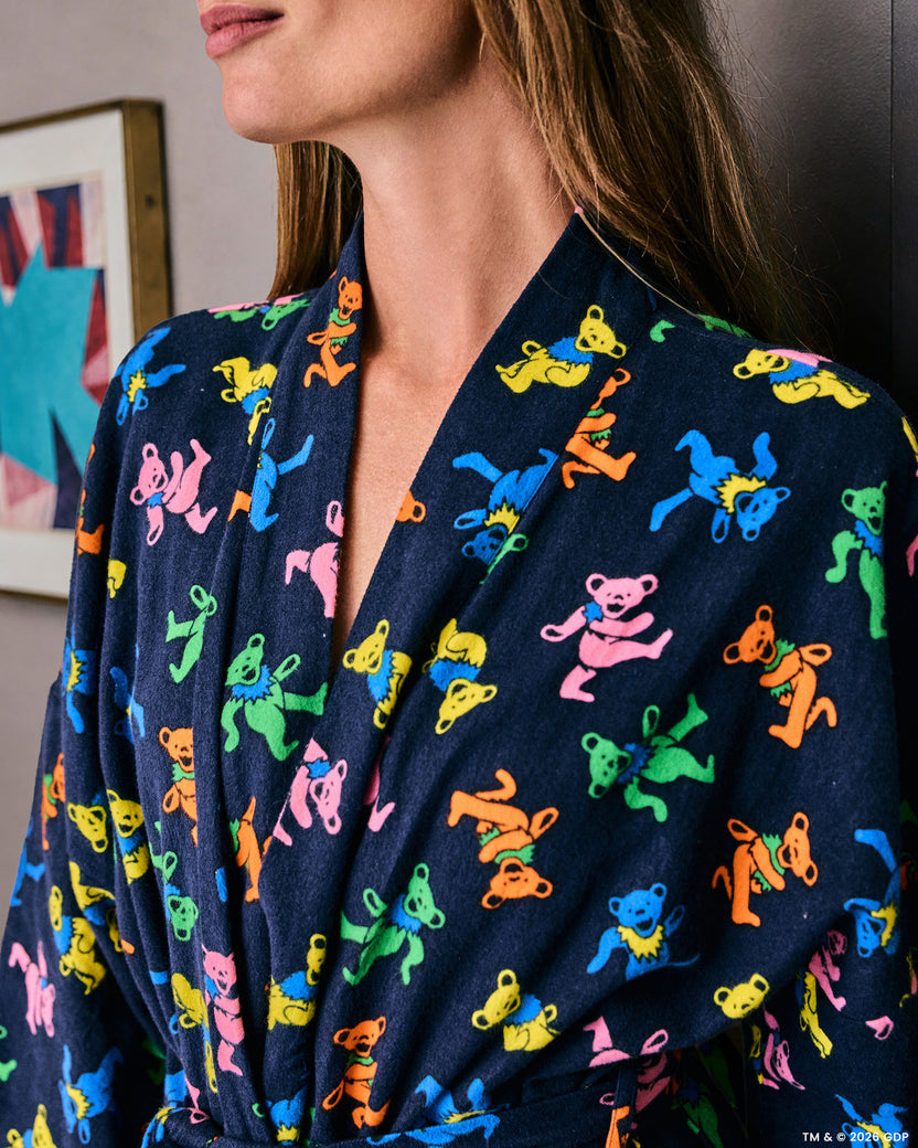 Close-up of the Dancing Bears long robe showing the printed shawl collar and colorful bear pattern.