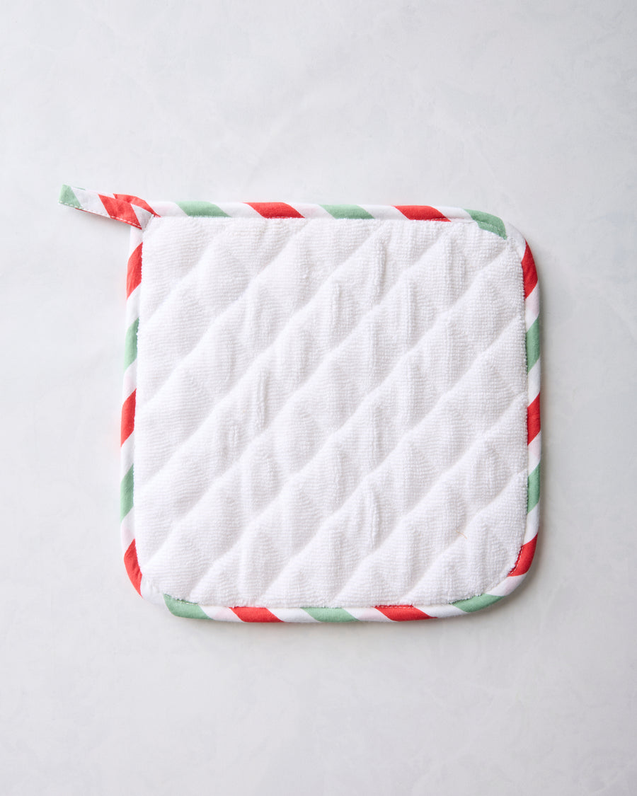 Back of the Good Dog Christmas pot holder with a white quilted surface and red-and-green striped trim