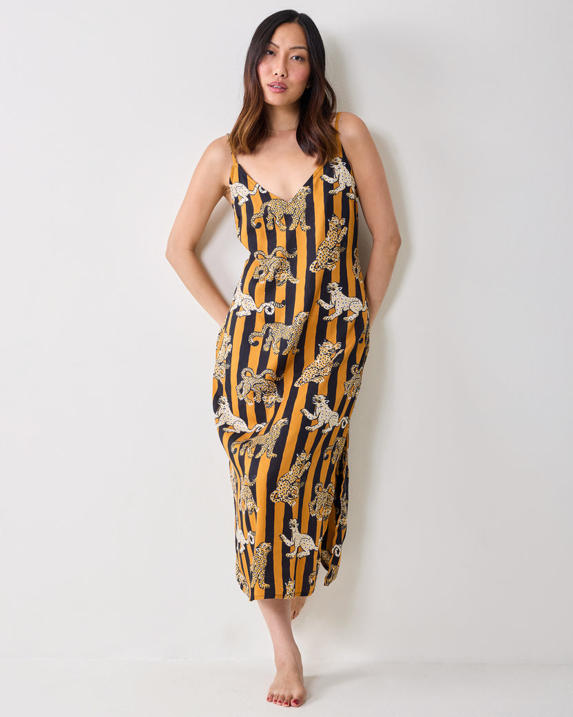 Full-length front view of a model wearing the Leopard Stripes Chic To Sleep nightie with thin shoulder straps and leopard print.