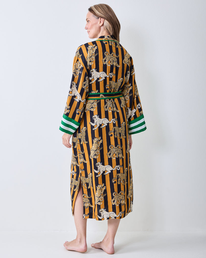 Back view of the butterscotch striped leopard-print robe with a green waistband and green-and-white striped cuffs.