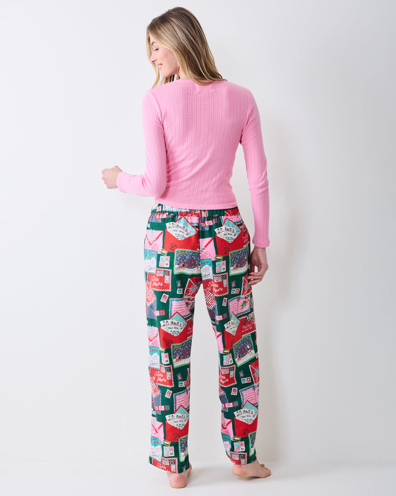 Back view of the printed Astrid pants showing the waistband, rear fit, and straight legs.