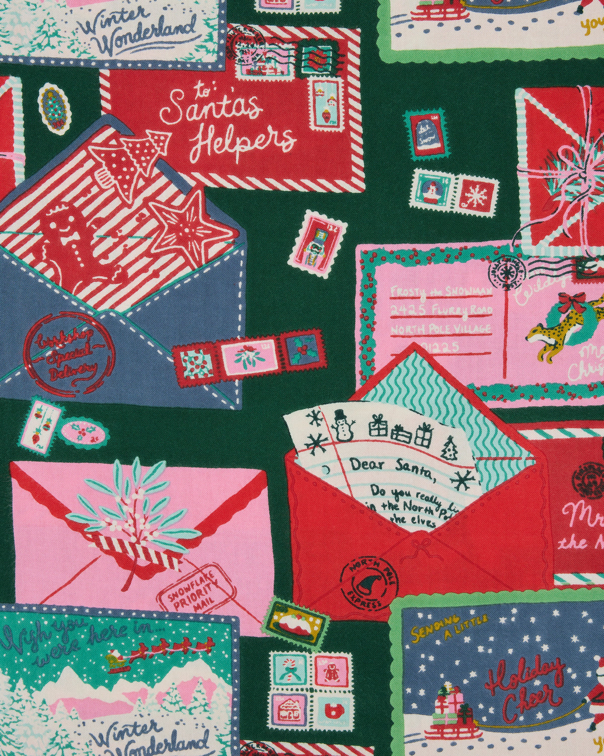 Close-up of the printed surface showing envelopes, stamps, letters, and winter holiday scenes.