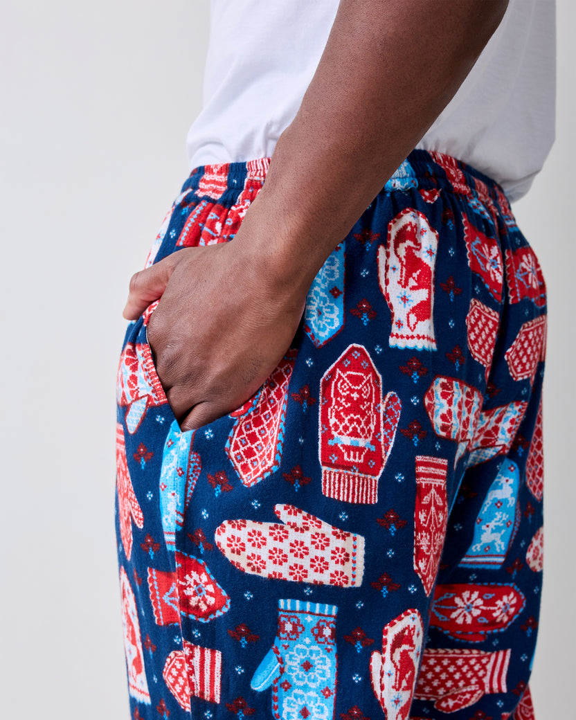 Close-up of the side pocket and mitten print on blue flannel men's pajama pants.