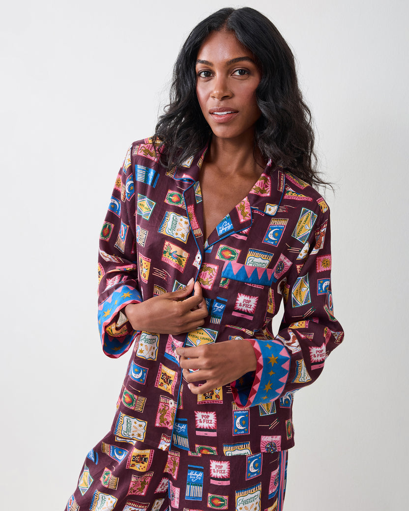 Front view of the Painted Matchbook Cabernet pajama top with notched collar, buttons, chest pocket, and patterned cuffs.