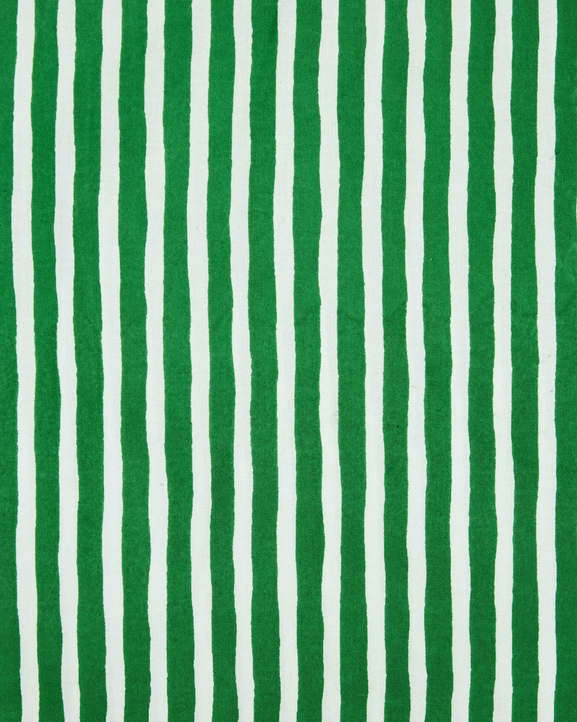 Close-up of green-and-white vertically striped fabric for the Nola pajama pants.
