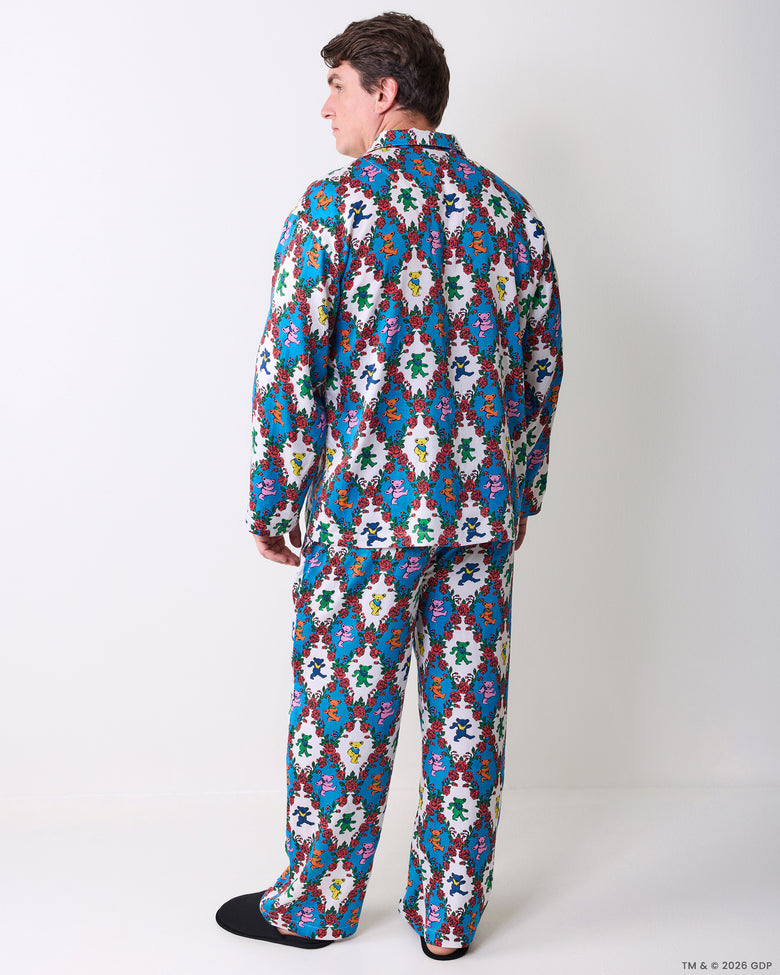 Model wearing the long bear-and-rose print pajama set, shown from the back.