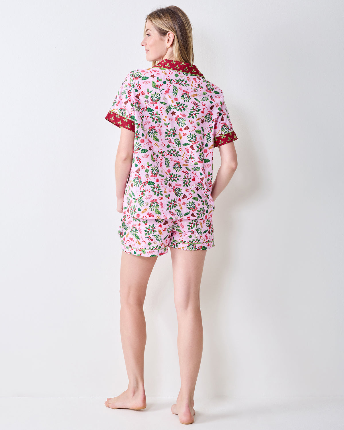 Back view of the Sweet Tooth Candy Pink short pajama set, showing the patterned shirt and matching shorts.