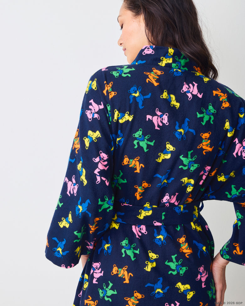 Back view of the Dancing Bears long robe showing the printed collar, tie belt, sleeves, and colorful bear pattern.