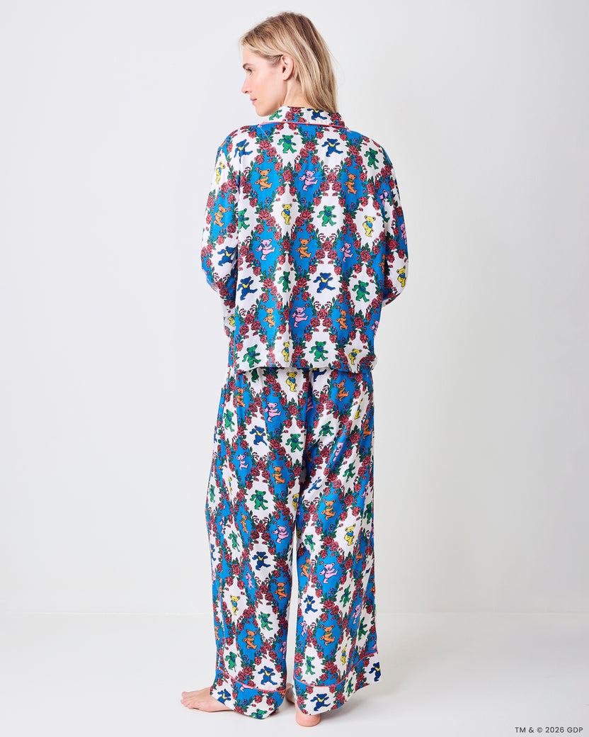 Model wearing the long bear-and-rose print pajama set, shown from the back.