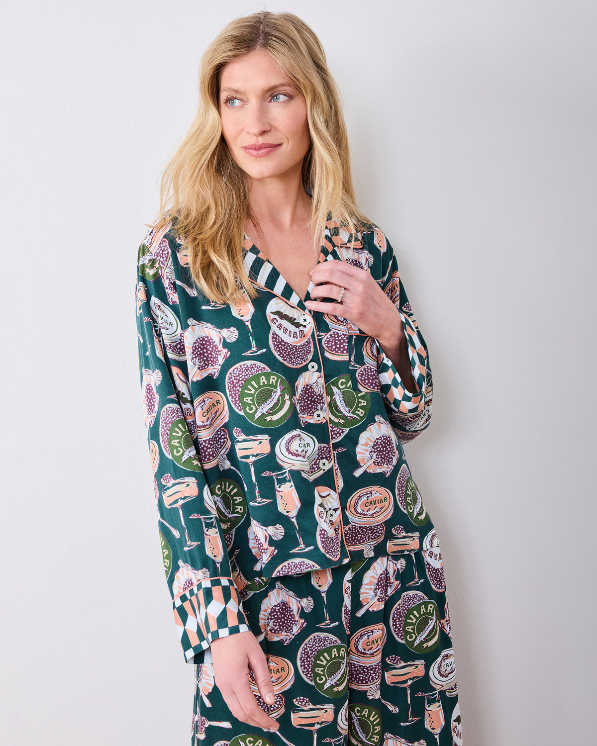 Front three-quarter view of the Champagne & Caviar Soho pajama set with a collared button-front top and wide-leg pants.