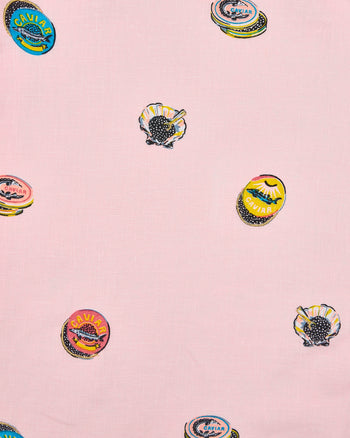 Pink patterned textile with illustrated caviar tins and open shells containing caviar.