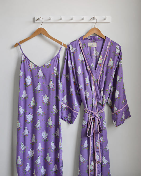 Eerie Amethyst Gardening Ghosts nightie and matching belted robe hanging on wooden hangers.
