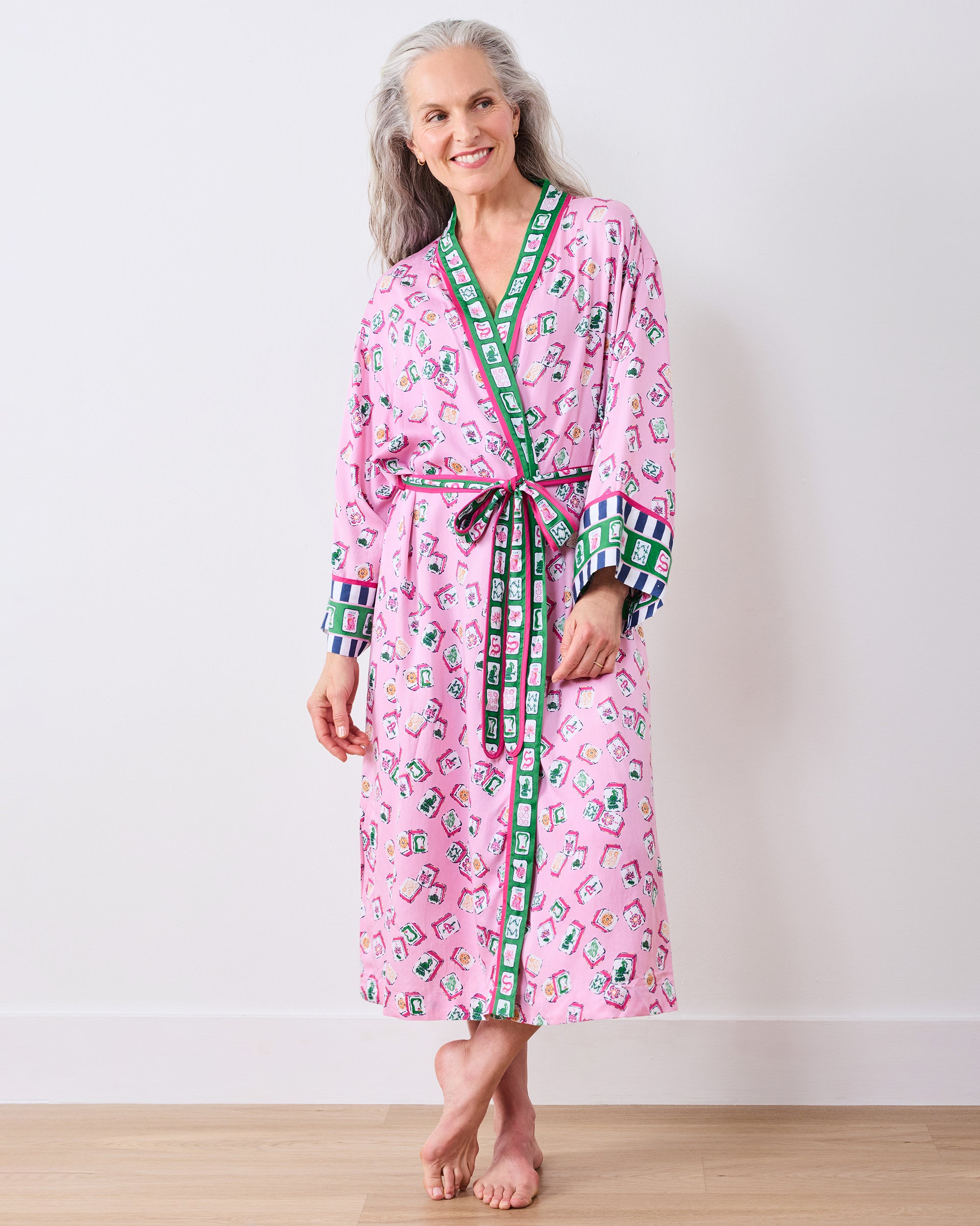 Full front view of the peony pink Lucky Tiles robe tied at the waist