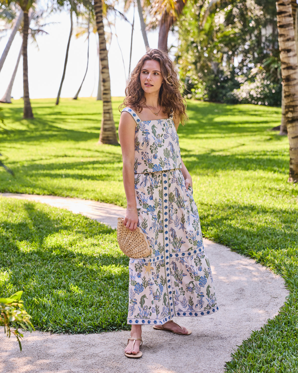 Full front view of the Saltwater Serenity Tessa Set with a sleeveless top and long button-front skirt in an underwater print