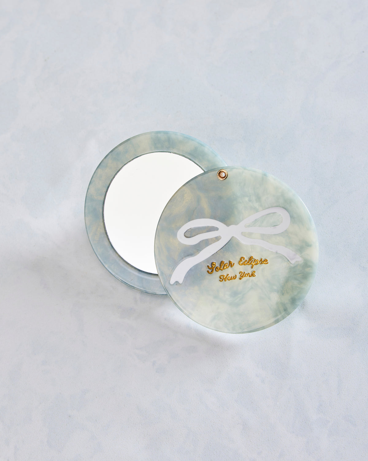 Solar Eclipse - Hand Painted Baby Blue Bow Compact Mirror - Baby Blue - Printfresh