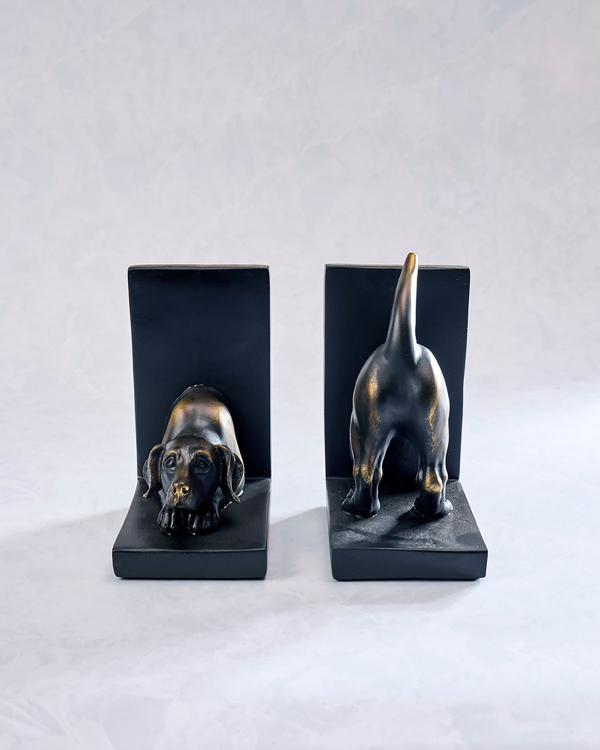 Front and rear views of two bronze-finish Labrador dog bookends on black rectangular bases.