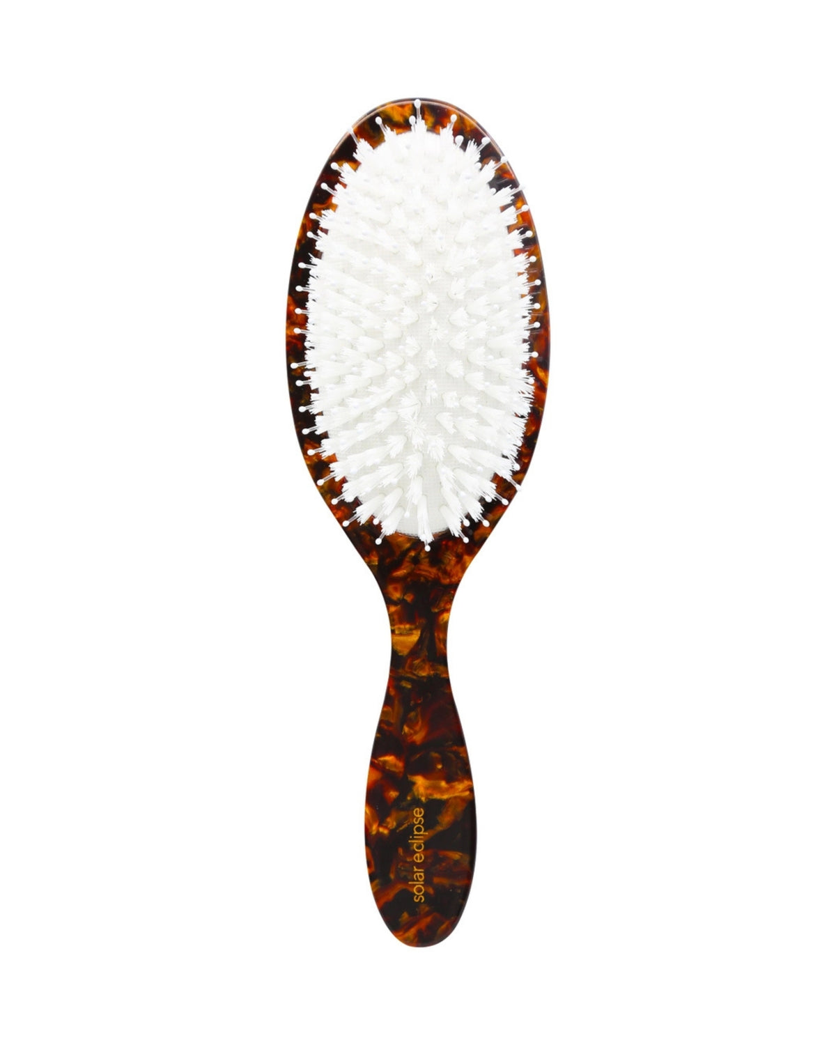 Brown tortoiseshell-style oval hair brush with white bristles and a narrow handle.