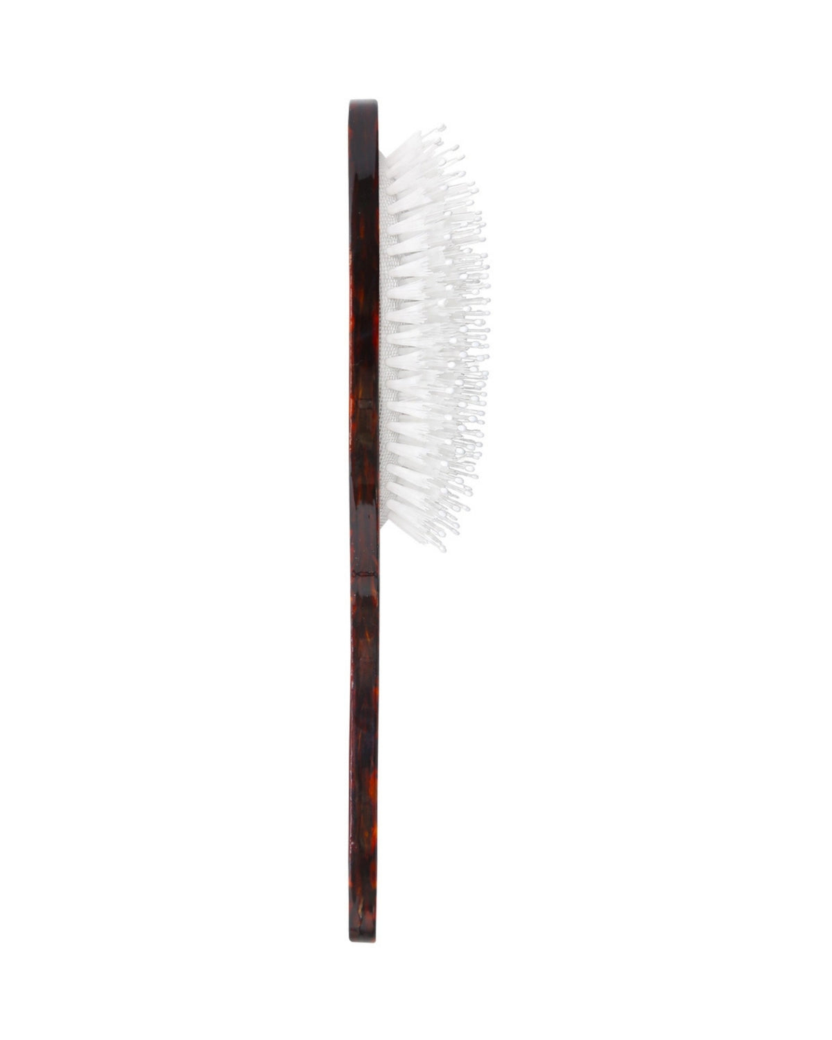 Side view of the brown patterned sunflower stem brush, showing the white bristles projecting from the handle.