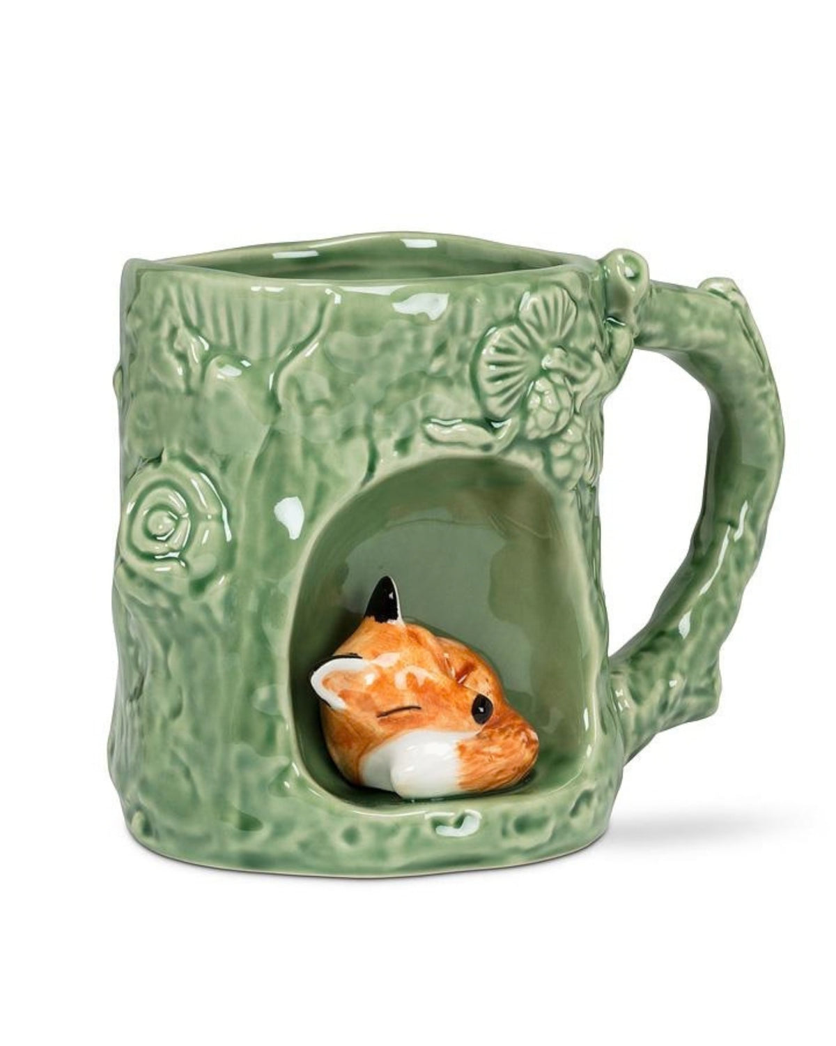 Front view of a green fox mug showing the fox face inside its recessed opening